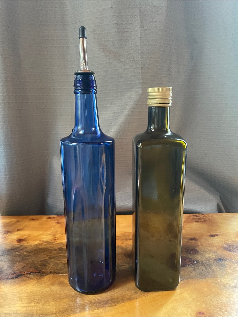 Two pour spout bottles